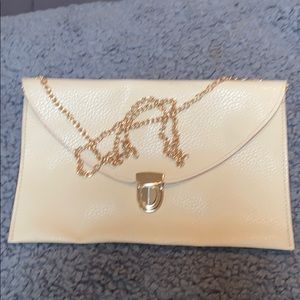 NWOT Baby pink clutch